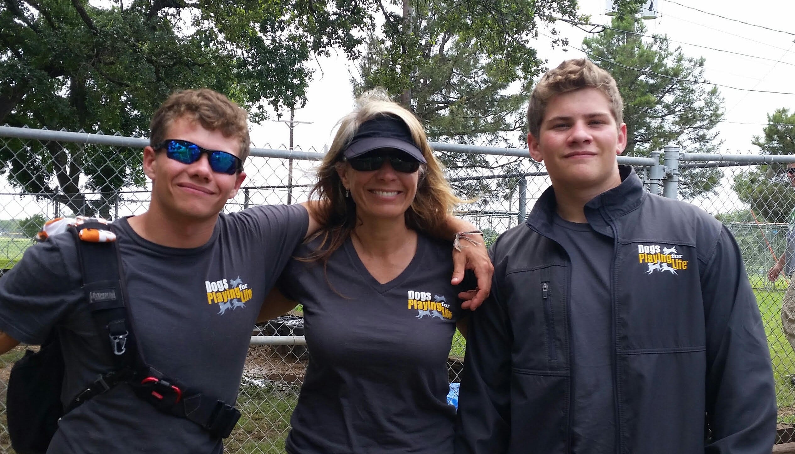 Dogs Playing for Life team members in DPFL apparel